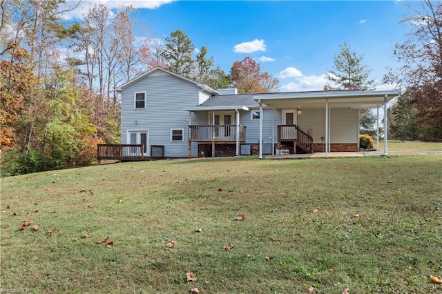 back of house featuring a yard