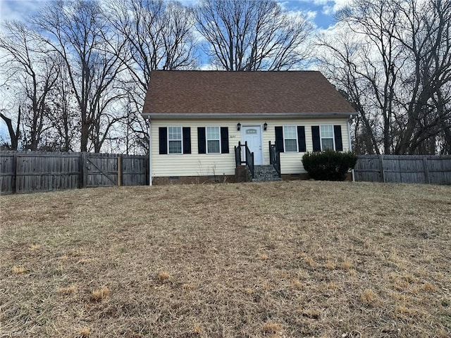 view of front of property with a front lawn