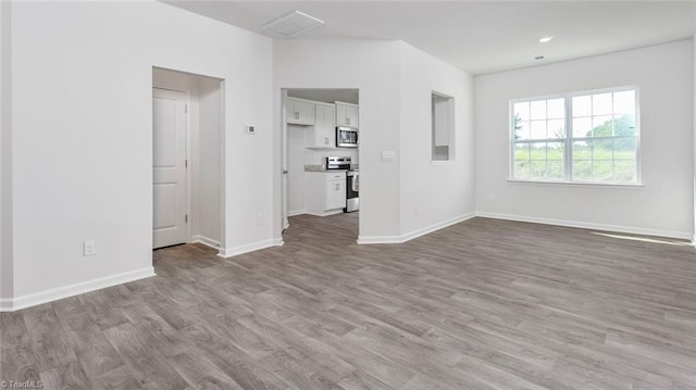 interior space with light hardwood / wood-style flooring