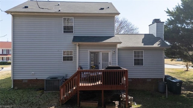 rear view of house with a deck, central AC, crawl space, and a chimney