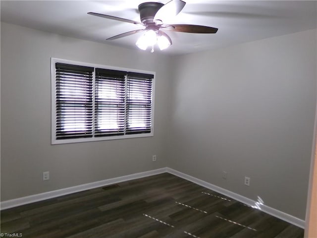 1074 Hickory Glen Rd, Winston-Salem, NC 27106 - unfurnished room with wood finished floors, ceiling fan, and baseboards