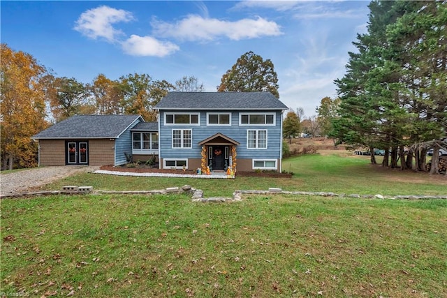 view of front of home featuring a front lawn