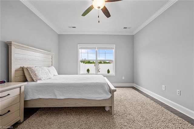 6624 Knob Creek Dr, Whitsett, NC 27377 - bedroom featuring baseboards, dark wood-style floors, crown molding, and ceiling fan
