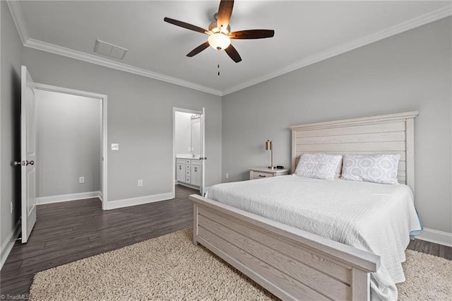 6624 Knob Creek Dr, Whitsett, NC 27377 - bedroom with wood finished floors, crown molding, baseboards, a ceiling fan, and ensuite bath