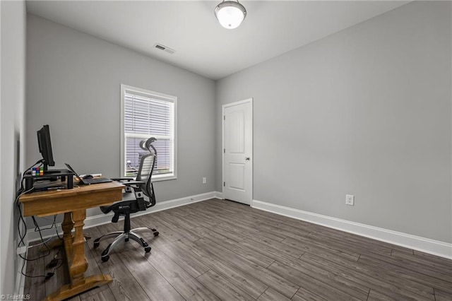 6624 Knob Creek Dr, Whitsett, NC 27377 - office area featuring dark wood-type flooring and baseboards