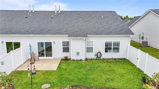 6624 Knob Creek Dr, Whitsett, NC 27377 - rear view of house with a patio, roof with shingles, and central AC unit