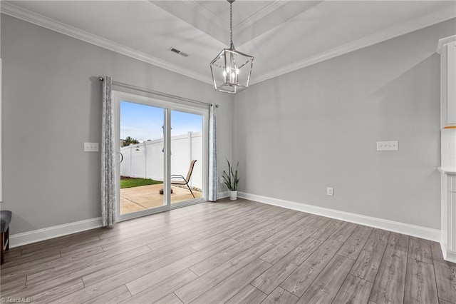 6624 Knob Creek Dr, Whitsett, NC 27377 - empty room featuring wood finished floors, a chandelier, crown molding, and baseboards