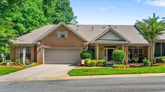3702 Belfry Ct, Greensboro, NC 27410 - view of front of home featuring brick siding, driveway, and a shingled roof