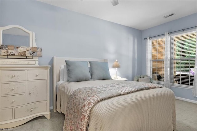 3702 Belfry Ct, Greensboro, NC 27410 - bedroom with light carpet, baseboards, and a ceiling fan