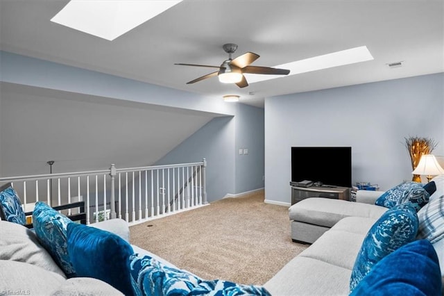 3702 Belfry Ct, Greensboro, NC 27410 - living room with a skylight, a ceiling fan, carpet floors, lofted ceiling, and baseboards