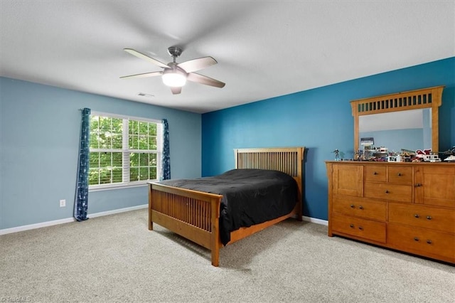 3702 Belfry Ct, Greensboro, NC 27410 - carpeted bedroom with baseboards and ceiling fan