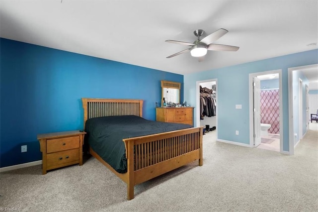 3702 Belfry Ct, Greensboro, NC 27410 - bedroom with a spacious closet, a closet, carpet flooring, and baseboards