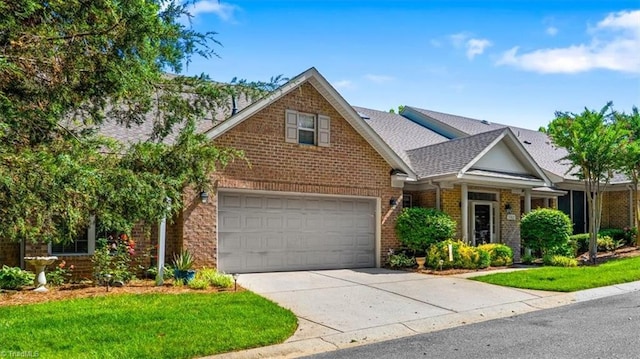 3702 Belfry Ct, Greensboro, NC 27410 - traditional-style home featuring brick siding, driveway, a shingled roof, and a front lawn
