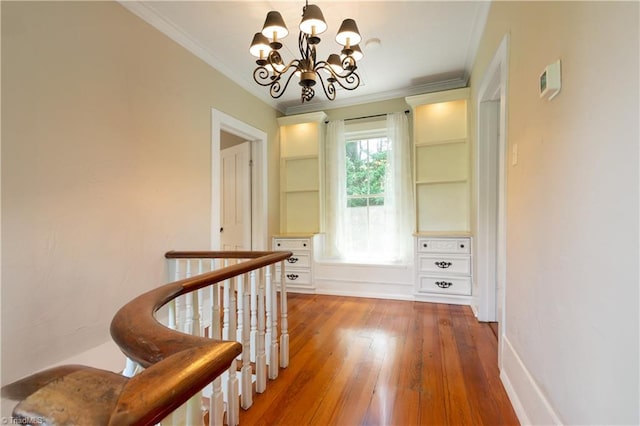 627 Mulberry St, Winston-Salem, NC 27101 - hallway featuring a chandelier, ornamental molding, and wood finished floors