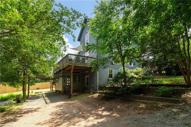 627 Mulberry St, Winston-Salem, NC 27101 - view of property exterior with a wooden deck and driveway