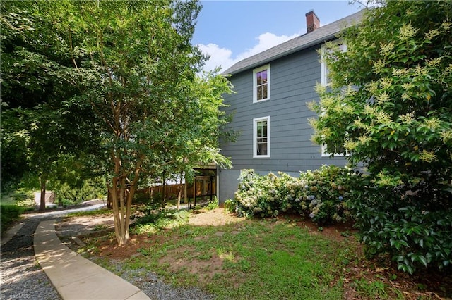 627 Mulberry St, Winston-Salem, NC 27101 - view of property exterior featuring a chimney