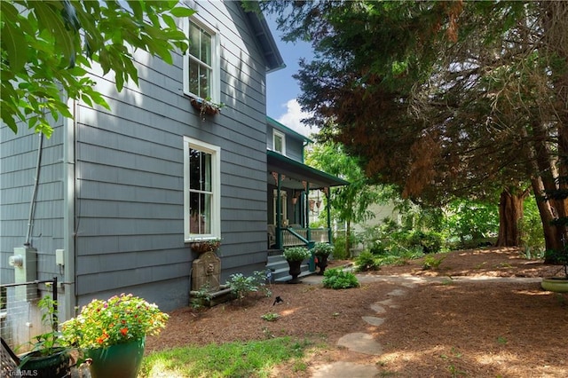 627 Mulberry St, Winston-Salem, NC 27101 - view of side of property with a porch
