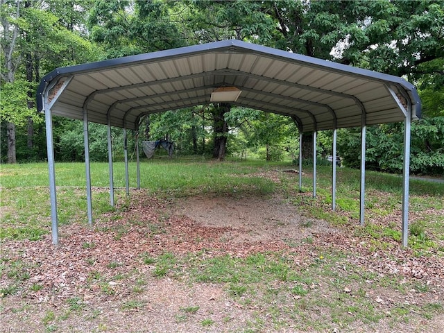 view of parking / parking lot featuring a carport