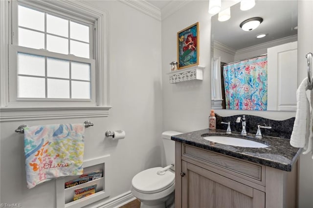 full bathroom with toilet, vanity, a shower with curtain, and ornamental molding