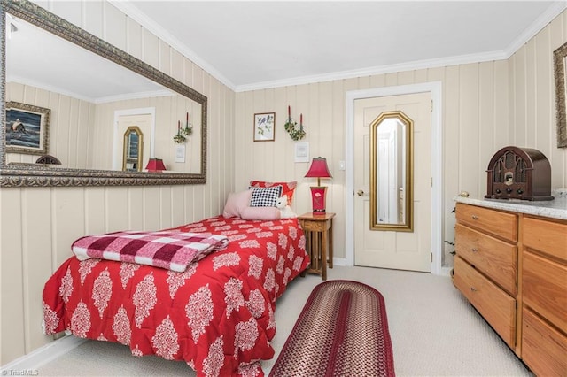 bedroom with light carpet and ornamental molding