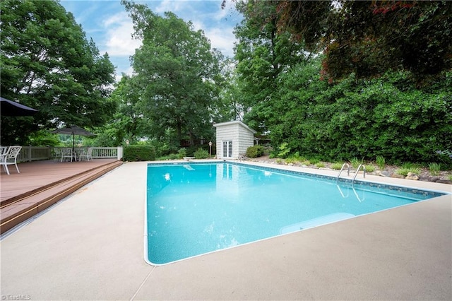 view of pool with a deck