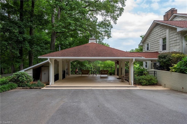 view of car parking featuring a carport