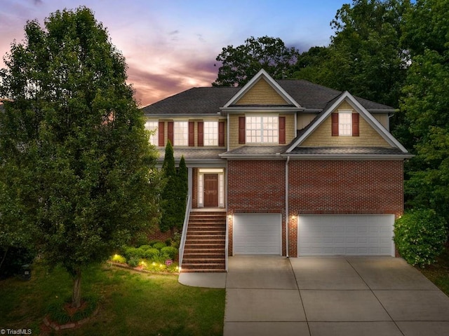 view of front of property with a garage