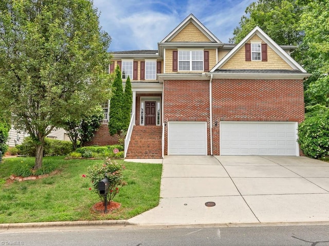 view of front of home featuring a garage and a front yard