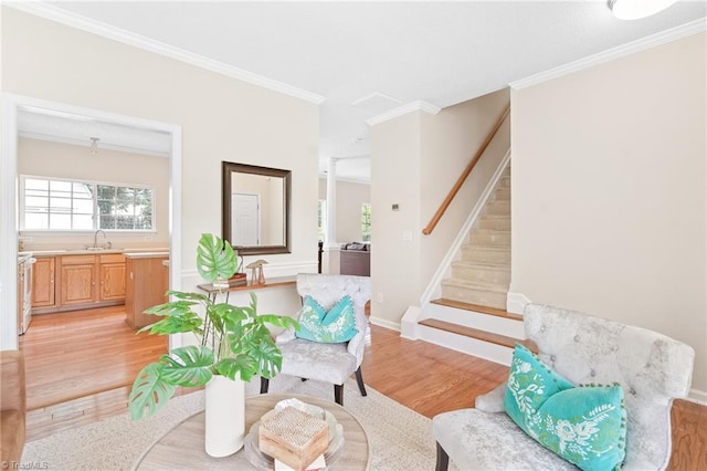 7 Pilot Ridge Ct, Greensboro, NC 27407 - sitting room featuring light wood-style flooring, stairs, crown molding, and baseboards