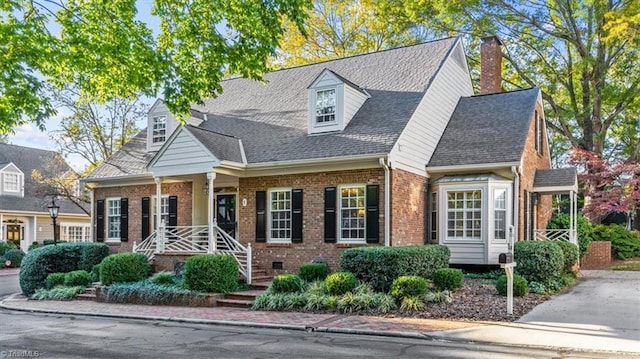 view of new england style home