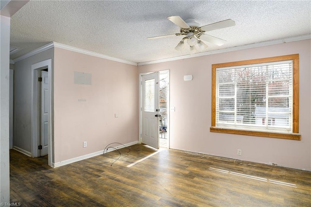 foyer featuring a wealth of natural light, crown molding, a textured ceiling, and wood finished floors