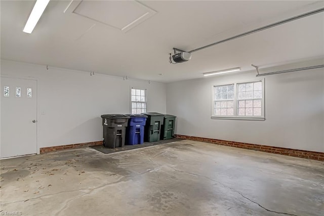 garage featuring a garage door opener