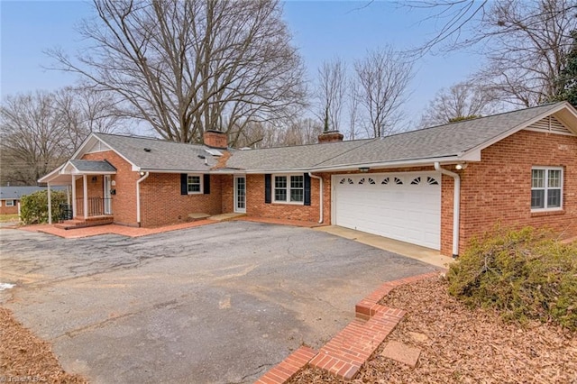 single story home with a garage