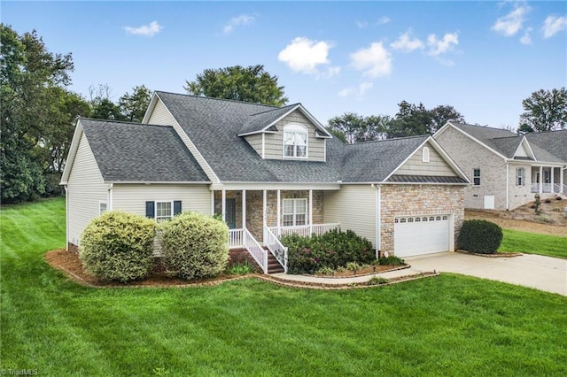 view of front of property with a front yard and covered porch