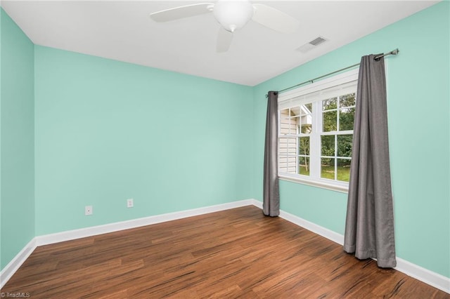 unfurnished room featuring ceiling fan and hardwood / wood-style flooring