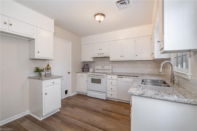 kitchen featuring visible vents, white cabinets, a sink, white appliances, and under cabinet range hood