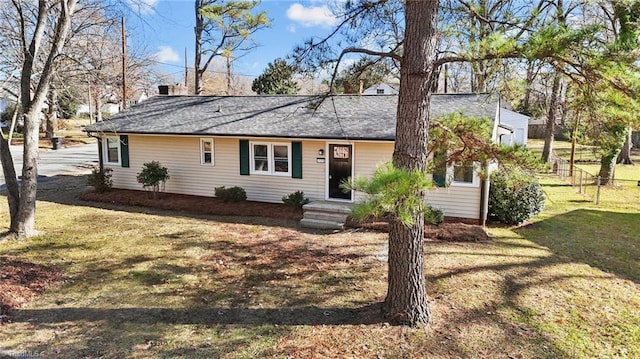 view of front facade with a front lawn