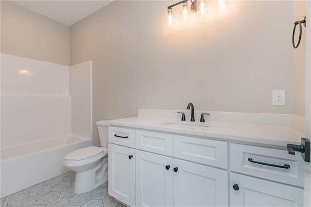 full bath with vanity, bathtub / shower combination, and toilet