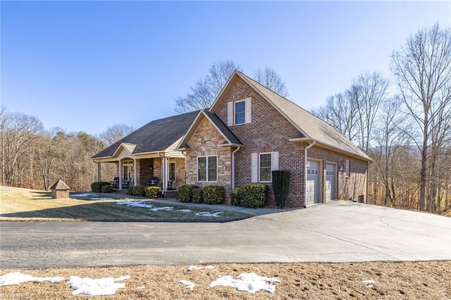 front facade featuring a garage and a porch