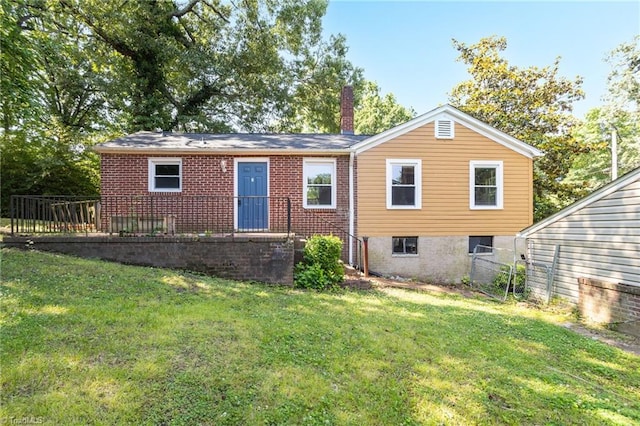 608 Spruce St, High Point, NC 27262 - back of house featuring brick siding and a chimney