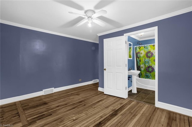 608 Spruce St, High Point, NC 27262 - spare room with wood finished floors, ceiling fan, and ornamental molding