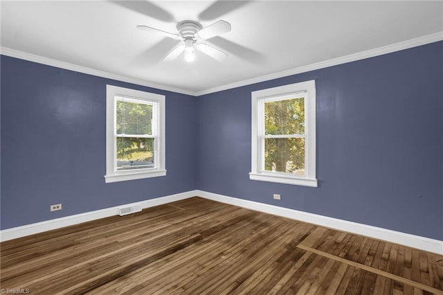608 Spruce St, High Point, NC 27262 - spare room with dark wood-style flooring, a ceiling fan, and crown molding