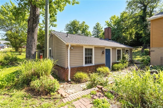 608 Spruce St, High Point, NC 27262 - view of front of property featuring a chimney and brick siding