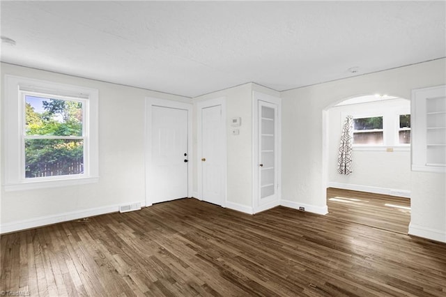 608 Spruce St, High Point, NC 27262 - spare room featuring wood finished floors and a textured ceiling