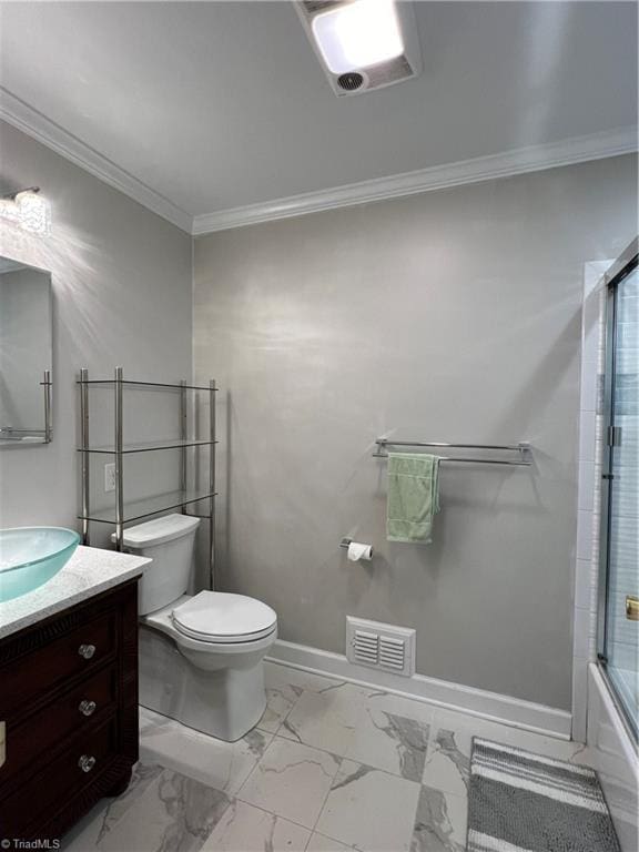 bathroom featuring visible vents, vanity, toilet, marble finish floor, and ornamental molding