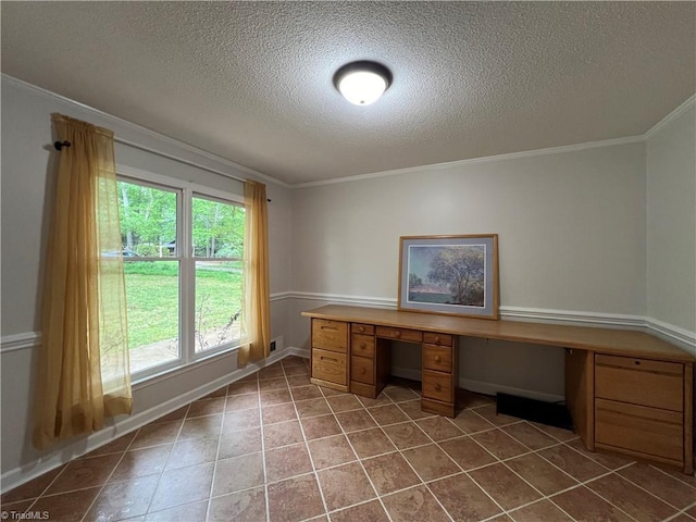 unfurnished office featuring crown molding, baseboards, tile patterned flooring, and a textured ceiling