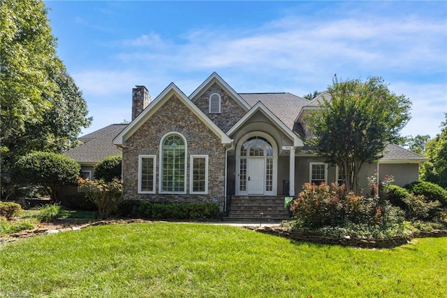 view of front of home with a front yard