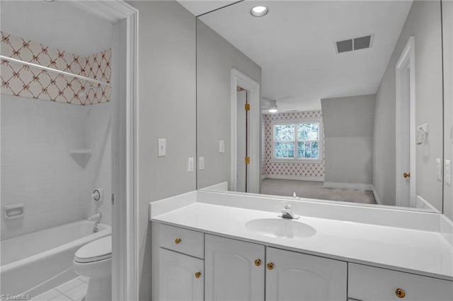 full bathroom with vanity, bathtub / shower combination, toilet, and tile patterned floors