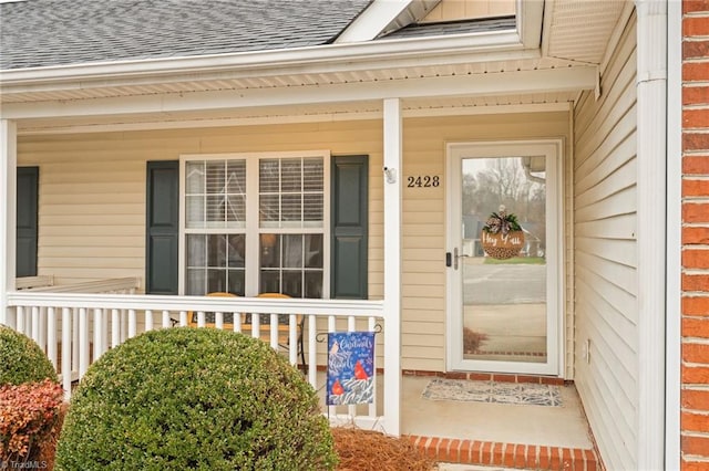 property entrance with a porch