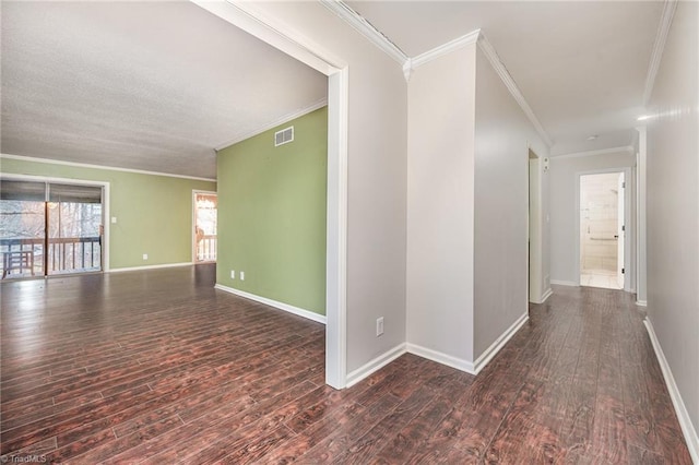 hallway featuring ornamental molding and dark hardwood / wood-style flooring